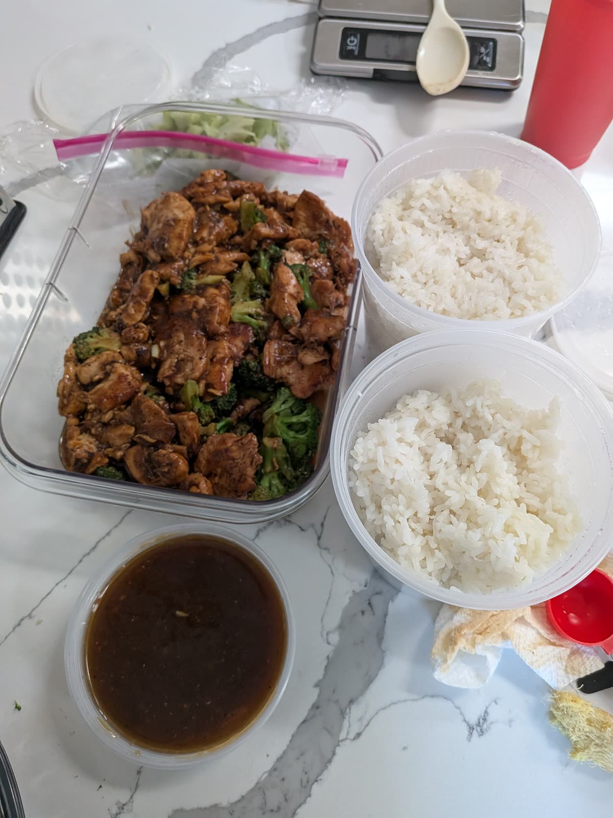 Chicken and broccoli with rice and sauce packed up